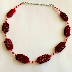 Vintage red acrylic necklace with gold accents